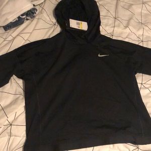 small, never-worn Nike hoodie, loose fit